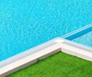 fake grass around your pool photo